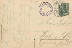 Eine alte Postkarte mit einer Briefmarke, auf der "Lichtenwald, Deutschland - Brief nach Deutschland" steht und handgeschriebener Text, mit zwei zusätzlichen Briefmarken in der oberen rechten Ecke.